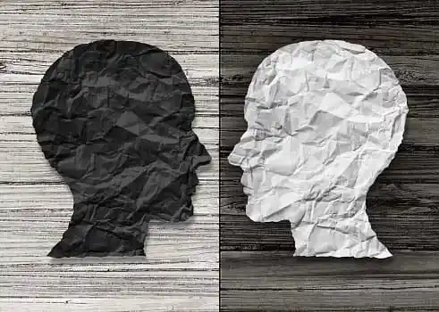 human head made of black and white papers